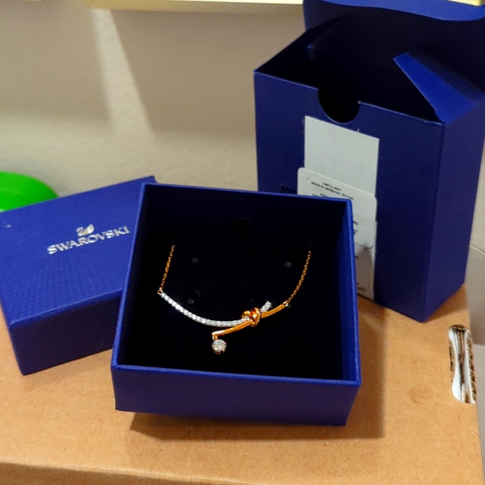 NWT Swarovski Silver and Rose Gold Toned Crescent Necklace with Crystal Accents